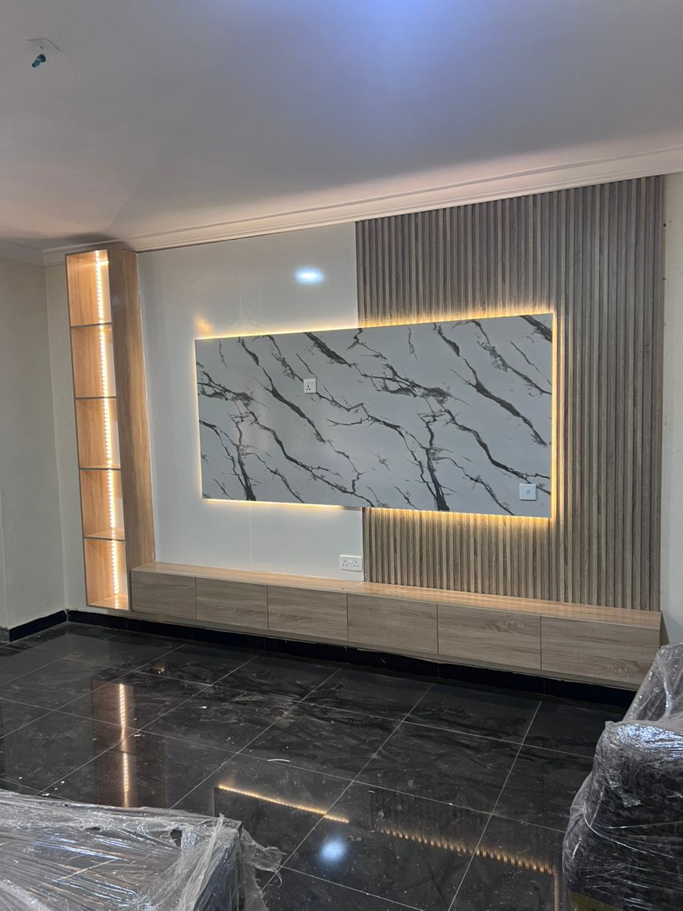 Buy Modern TV Wall Panel with Marble Finish, LED Lighting & Storage